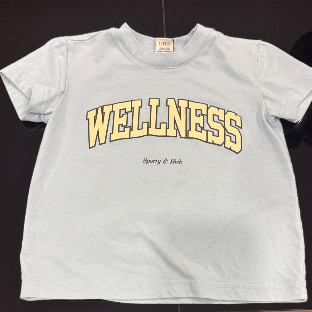 Sporty & Rich Light Blue "WELLNESS" Kids Graphic Tee
